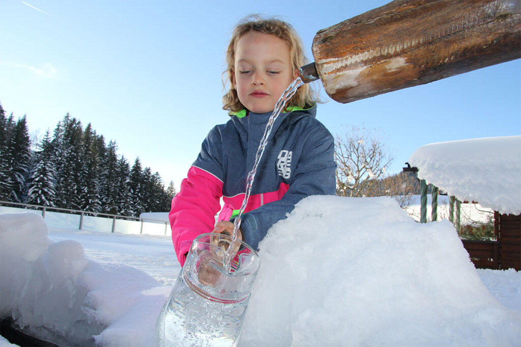Brunnen im Winter, Gästehaus Herrmann
